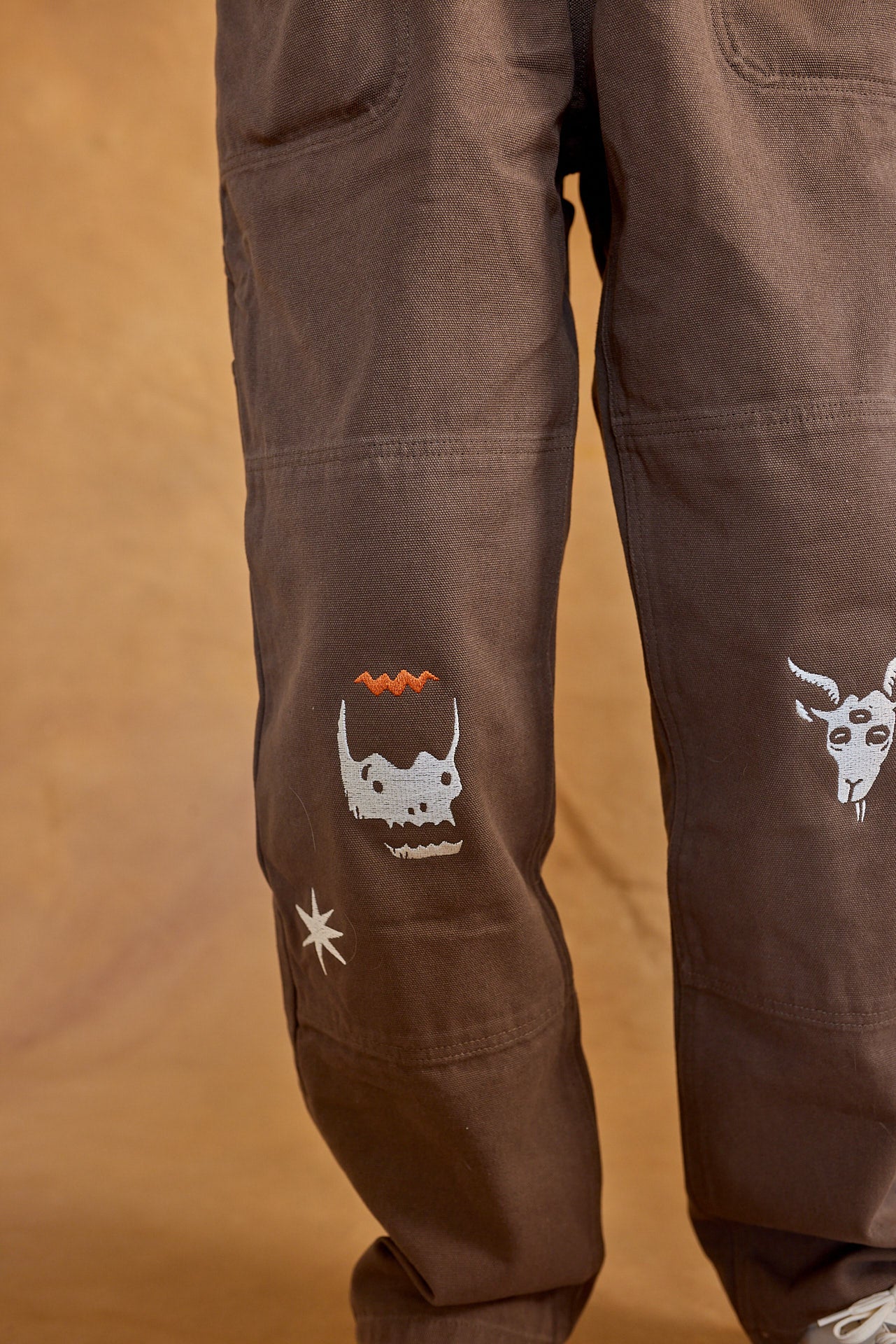 BE BAD CLUB CANVAS COVERALL